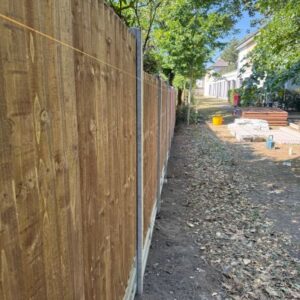 garden fence installation showing plumb line